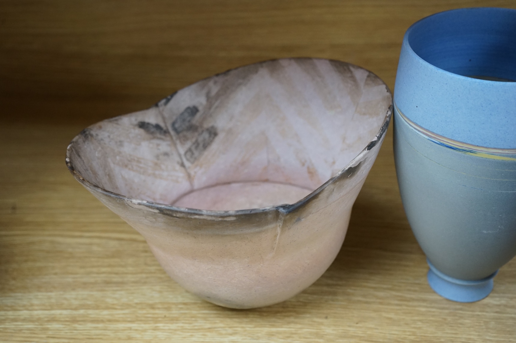 A studio pottery with incised initialled, dated ‘73 and a similar bowl, largest 21cm in diameter